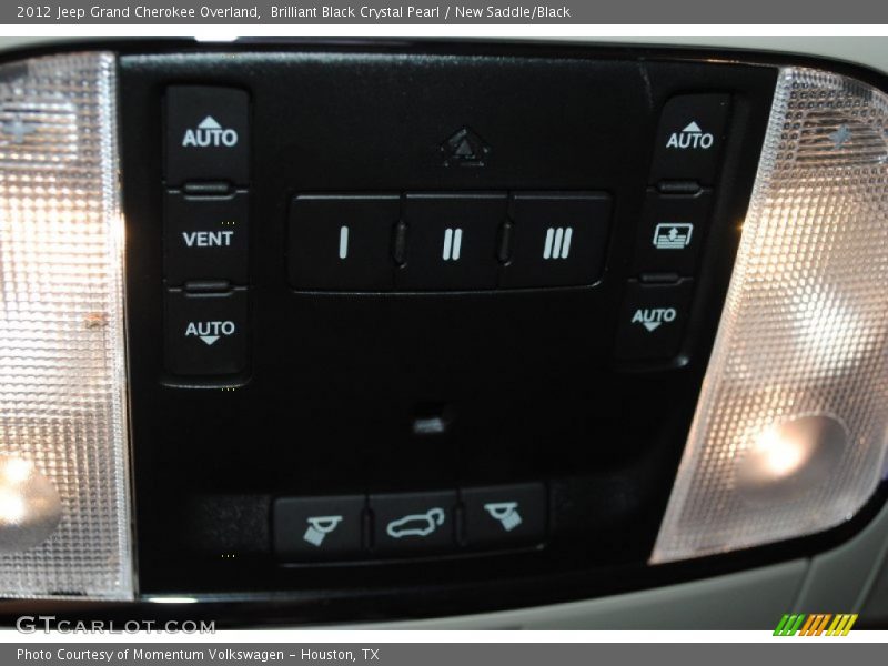 Brilliant Black Crystal Pearl / New Saddle/Black 2012 Jeep Grand Cherokee Overland