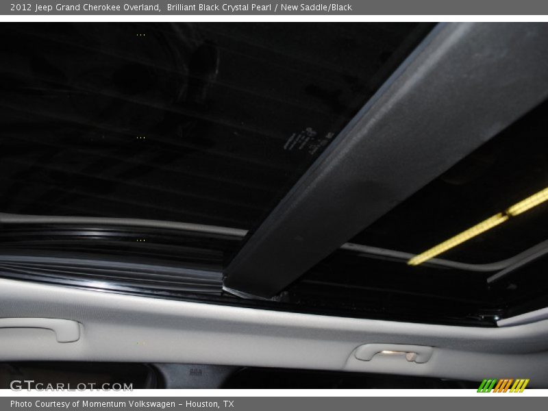 Brilliant Black Crystal Pearl / New Saddle/Black 2012 Jeep Grand Cherokee Overland