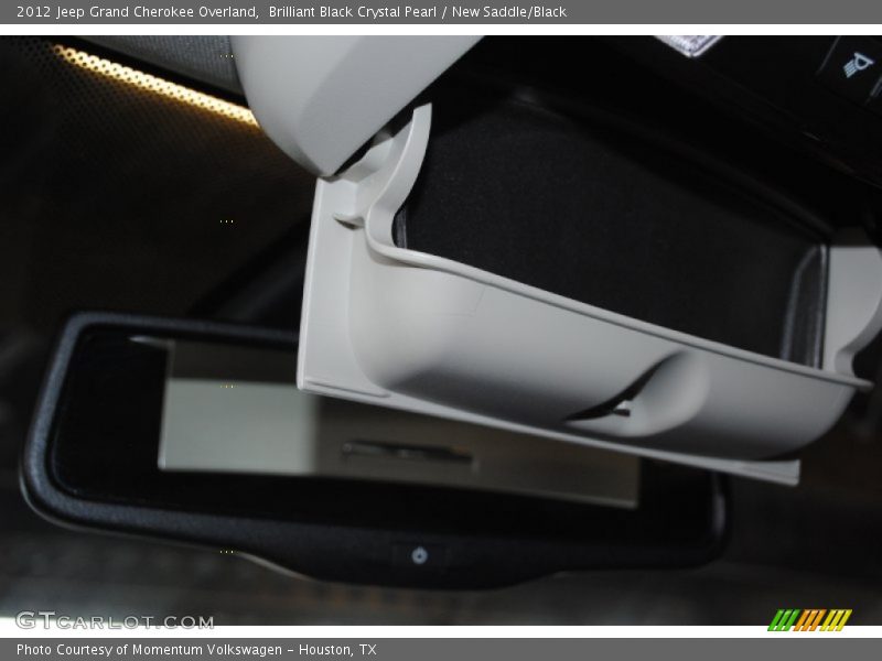 Brilliant Black Crystal Pearl / New Saddle/Black 2012 Jeep Grand Cherokee Overland