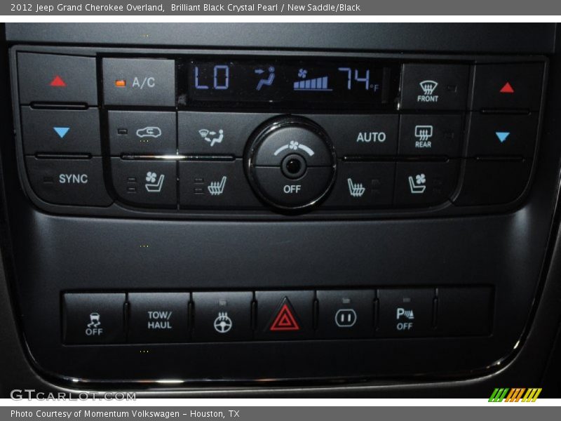 Brilliant Black Crystal Pearl / New Saddle/Black 2012 Jeep Grand Cherokee Overland