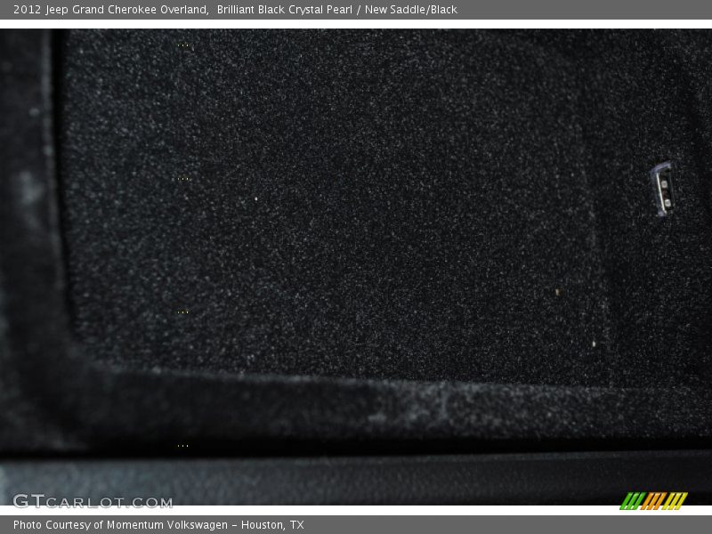 Brilliant Black Crystal Pearl / New Saddle/Black 2012 Jeep Grand Cherokee Overland