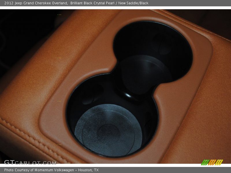 Brilliant Black Crystal Pearl / New Saddle/Black 2012 Jeep Grand Cherokee Overland