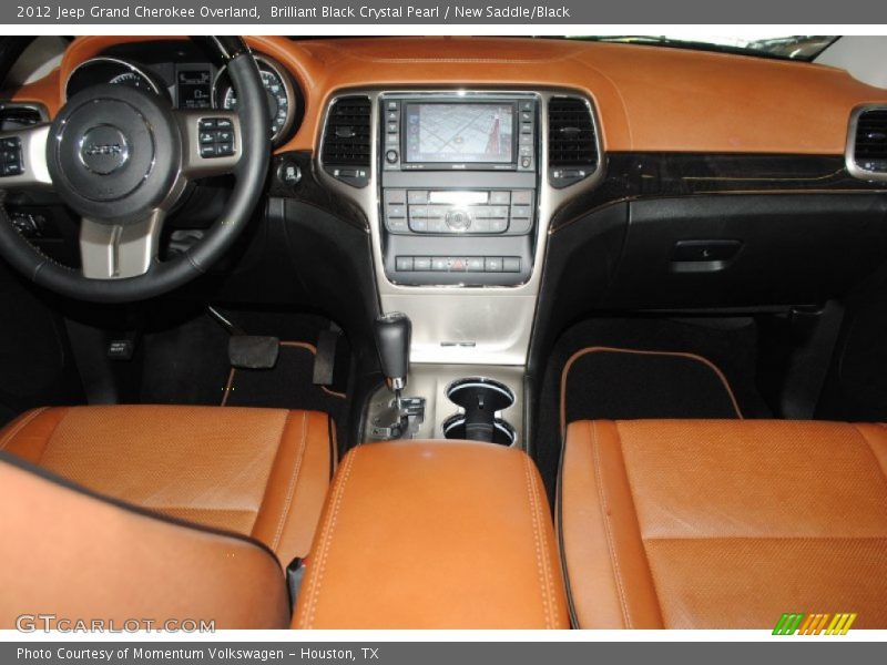 Brilliant Black Crystal Pearl / New Saddle/Black 2012 Jeep Grand Cherokee Overland