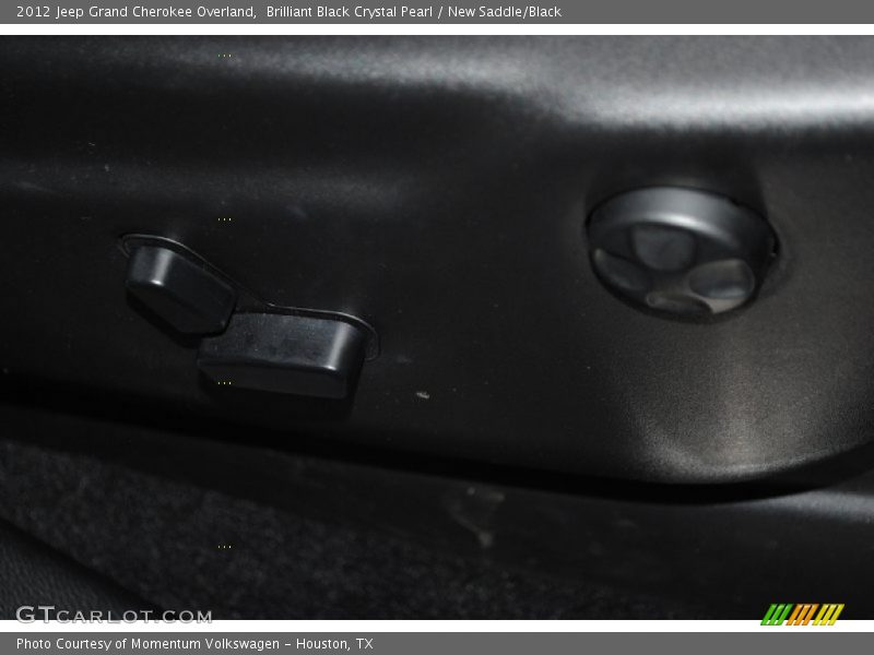 Brilliant Black Crystal Pearl / New Saddle/Black 2012 Jeep Grand Cherokee Overland