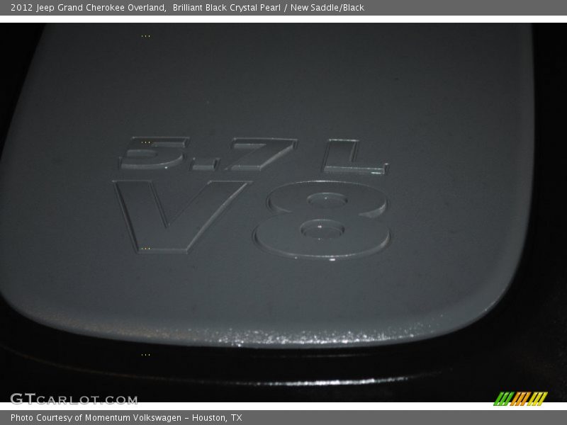 Brilliant Black Crystal Pearl / New Saddle/Black 2012 Jeep Grand Cherokee Overland