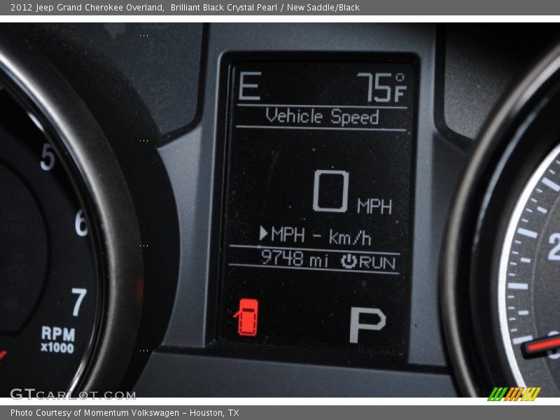 Brilliant Black Crystal Pearl / New Saddle/Black 2012 Jeep Grand Cherokee Overland