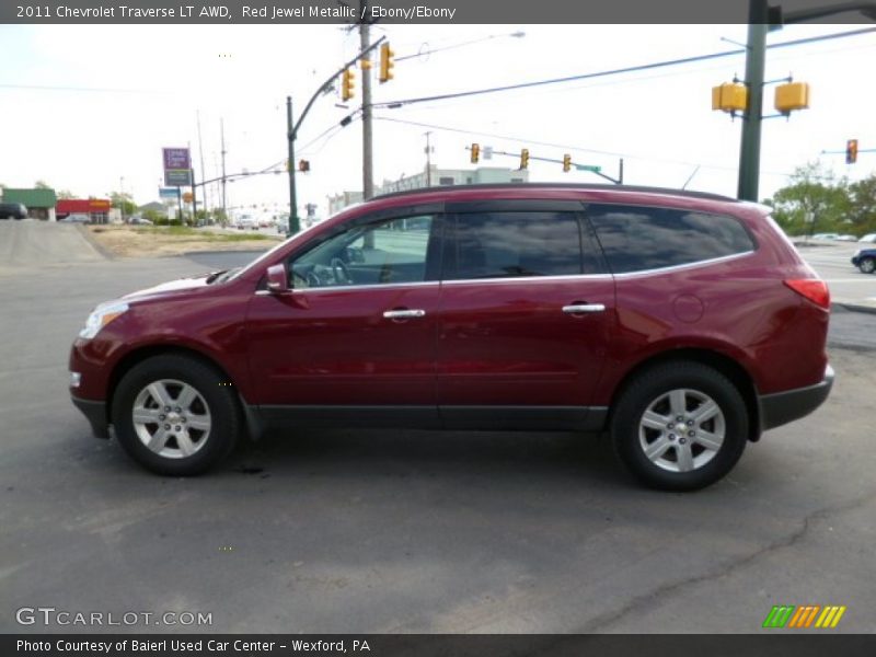Red Jewel Metallic / Ebony/Ebony 2011 Chevrolet Traverse LT AWD
