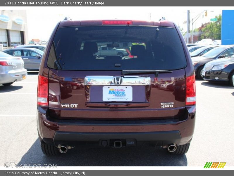 Dark Cherry Pearl / Beige 2011 Honda Pilot Touring 4WD