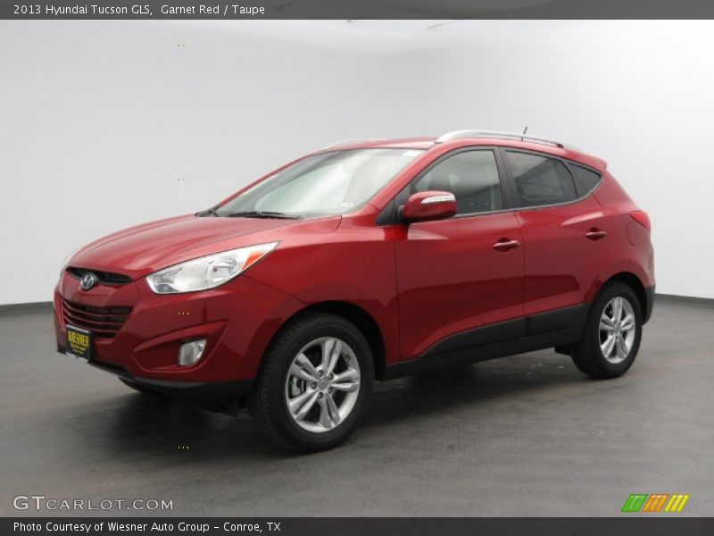 Garnet Red / Taupe 2013 Hyundai Tucson GLS