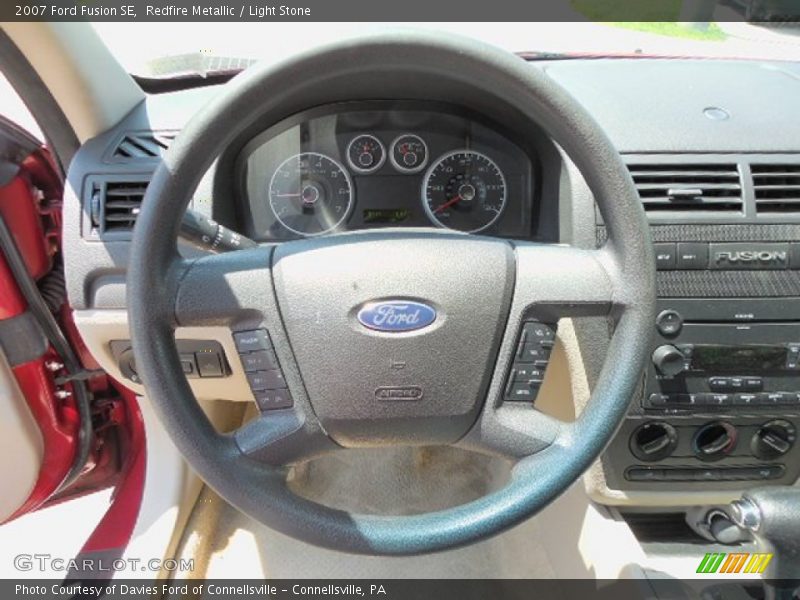 Redfire Metallic / Light Stone 2007 Ford Fusion SE