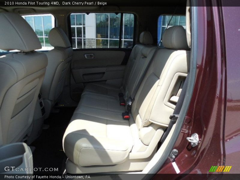Dark Cherry Pearl / Beige 2010 Honda Pilot Touring 4WD
