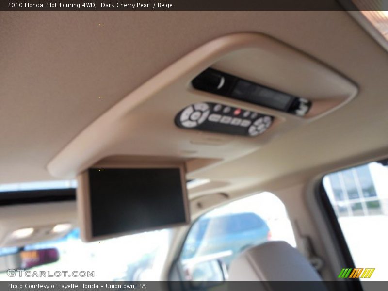 Dark Cherry Pearl / Beige 2010 Honda Pilot Touring 4WD