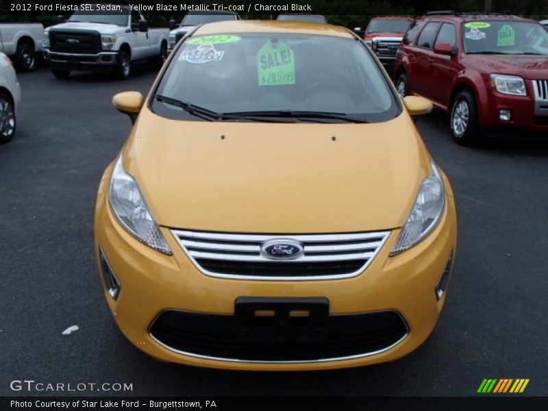 Yellow Blaze Metallic Tri-coat / Charcoal Black 2012 Ford Fiesta SEL Sedan