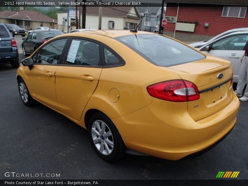 Yellow Blaze Metallic Tri-coat / Charcoal Black 2012 Ford Fiesta SEL Sedan