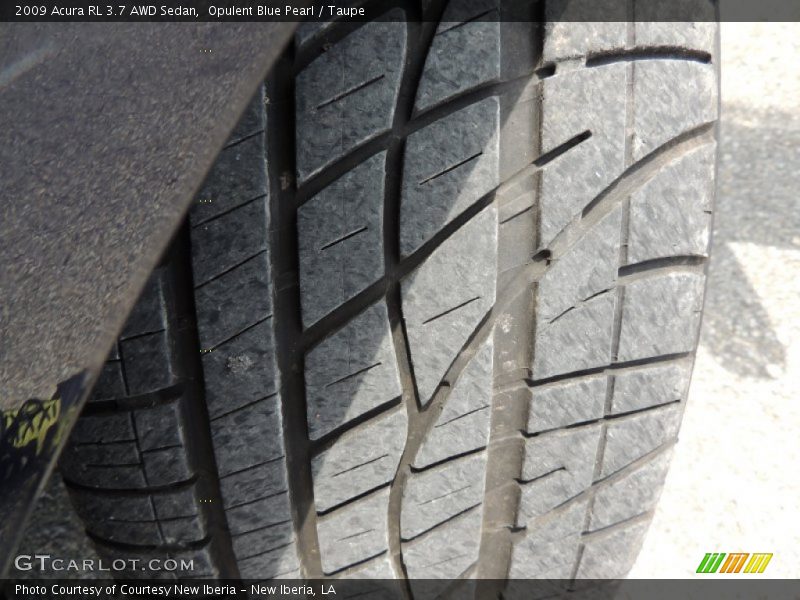 Opulent Blue Pearl / Taupe 2009 Acura RL 3.7 AWD Sedan