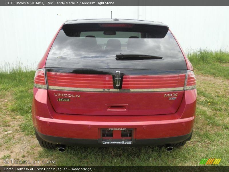 Red Candy Metallic / Medium Light Stone 2010 Lincoln MKX AWD