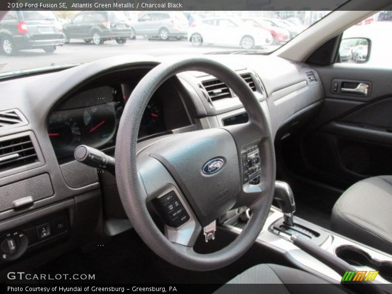 Atlantis Green Metallic / Charcoal Black 2010 Ford Fusion SE