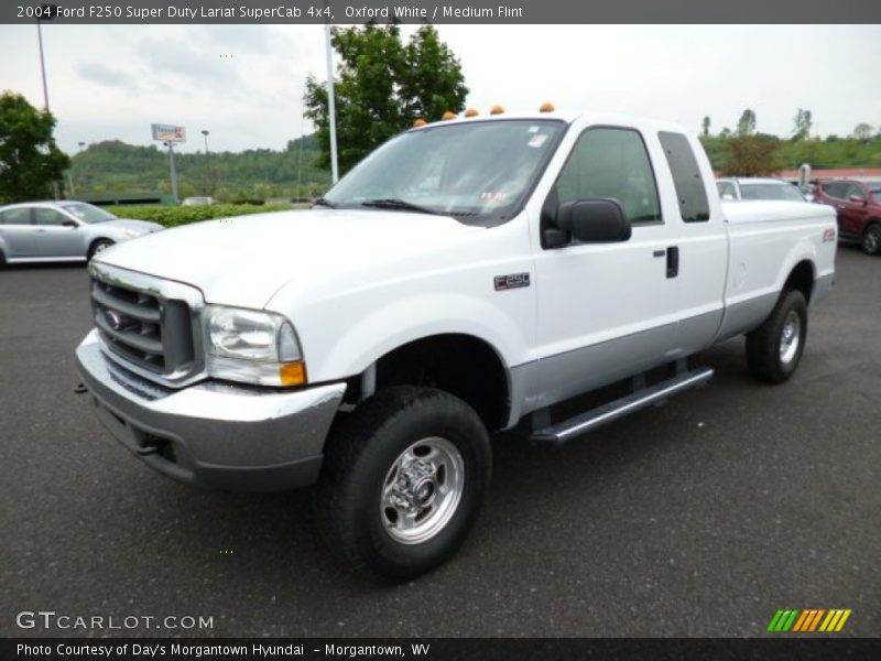 Front 3/4 View of 2004 F250 Super Duty Lariat SuperCab 4x4