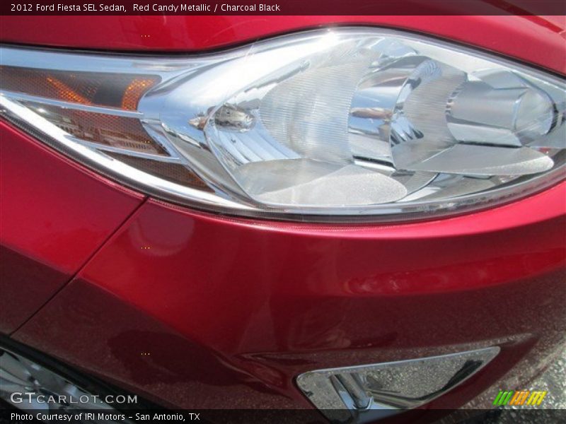 Red Candy Metallic / Charcoal Black 2012 Ford Fiesta SEL Sedan