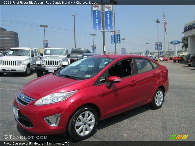 Red Candy Metallic / Charcoal Black 2012 Ford Fiesta SEL Sedan