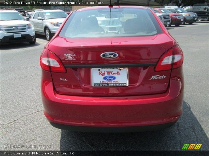 Red Candy Metallic / Charcoal Black 2012 Ford Fiesta SEL Sedan