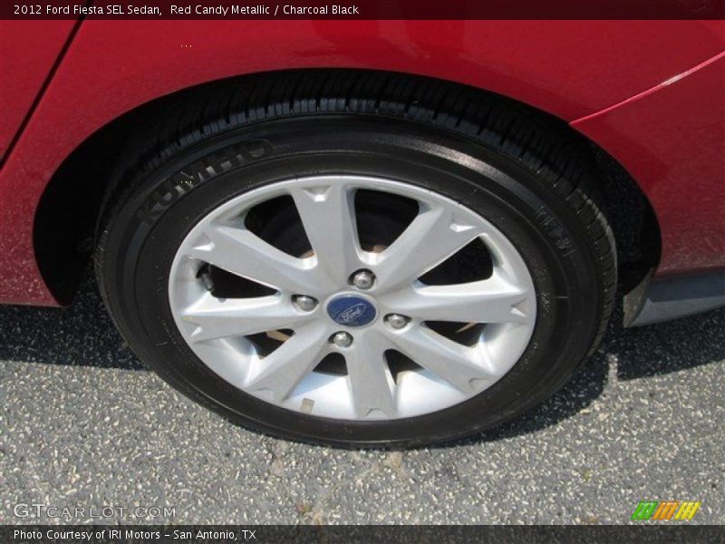Red Candy Metallic / Charcoal Black 2012 Ford Fiesta SEL Sedan