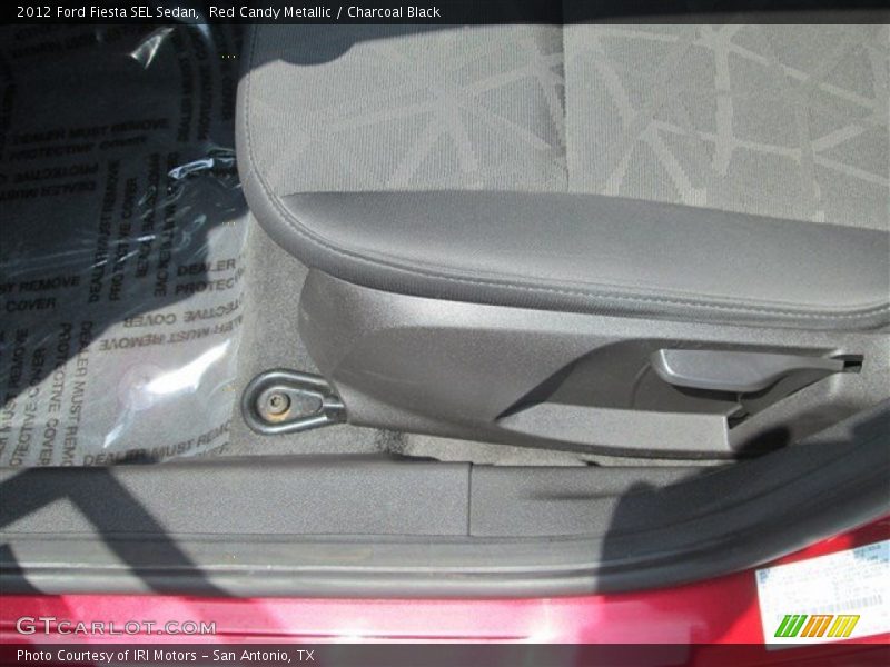 Red Candy Metallic / Charcoal Black 2012 Ford Fiesta SEL Sedan
