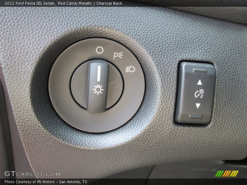 Red Candy Metallic / Charcoal Black 2012 Ford Fiesta SEL Sedan