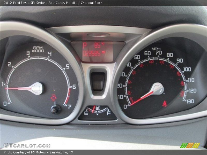 Red Candy Metallic / Charcoal Black 2012 Ford Fiesta SEL Sedan