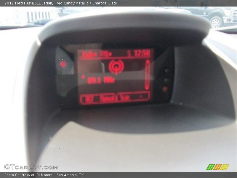 Red Candy Metallic / Charcoal Black 2012 Ford Fiesta SEL Sedan