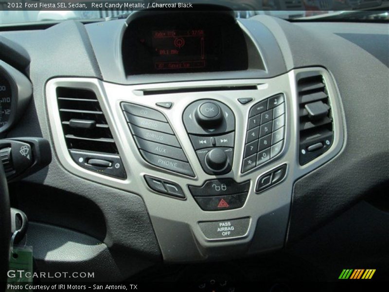 Red Candy Metallic / Charcoal Black 2012 Ford Fiesta SEL Sedan