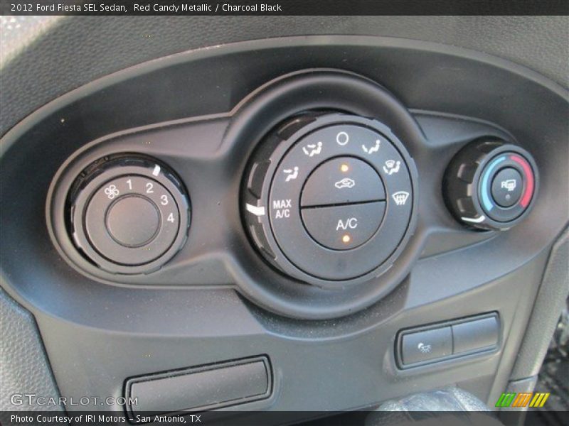 Red Candy Metallic / Charcoal Black 2012 Ford Fiesta SEL Sedan