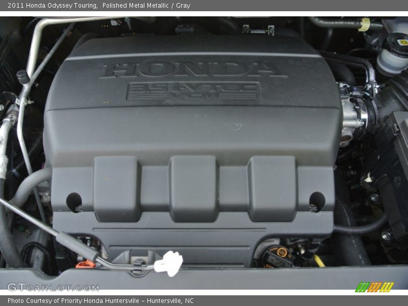 Polished Metal Metallic / Gray 2011 Honda Odyssey Touring