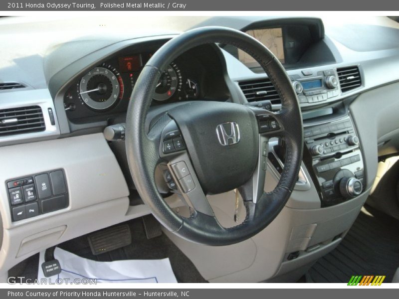 Polished Metal Metallic / Gray 2011 Honda Odyssey Touring