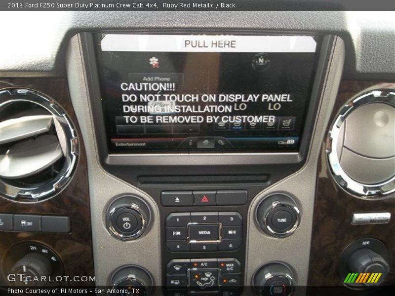 Ruby Red Metallic / Black 2013 Ford F250 Super Duty Platinum Crew Cab 4x4