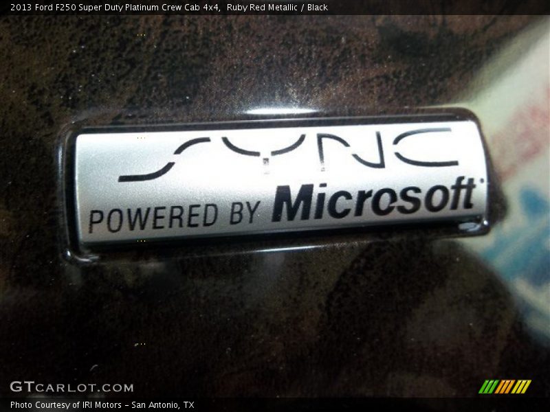 Ruby Red Metallic / Black 2013 Ford F250 Super Duty Platinum Crew Cab 4x4