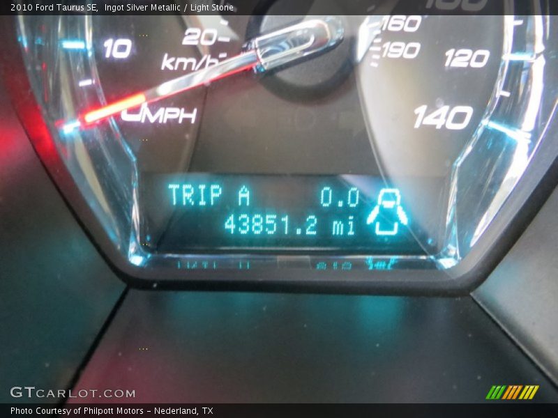 Ingot Silver Metallic / Light Stone 2010 Ford Taurus SE