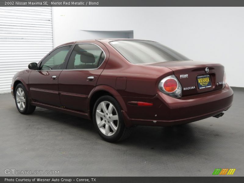 Merlot Red Metallic / Blond 2002 Nissan Maxima SE