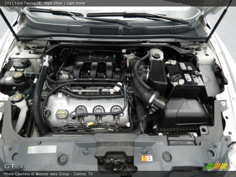 Ingot Silver / Light Stone 2011 Ford Taurus SE