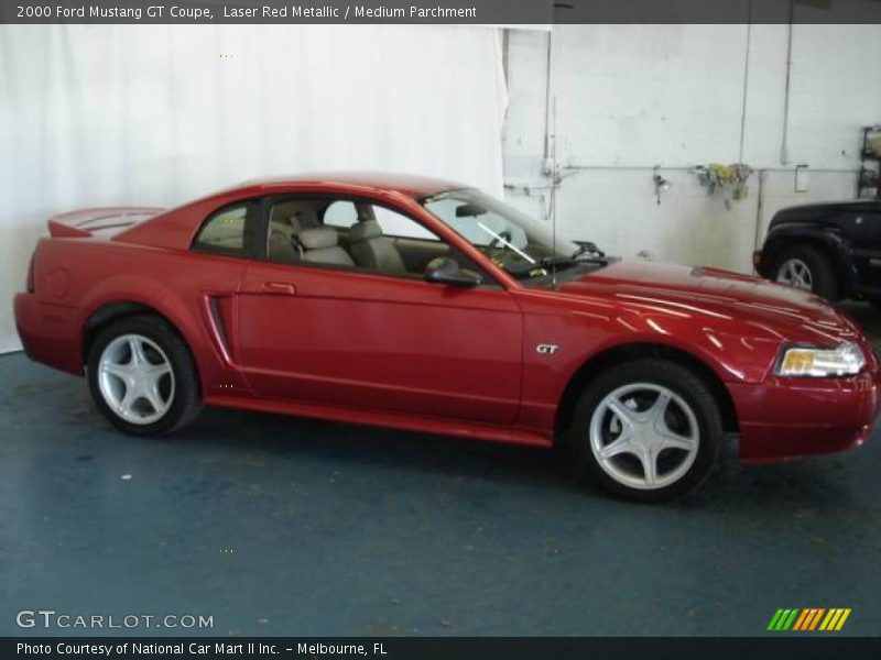 Laser Red Metallic / Medium Parchment 2000 Ford Mustang GT Coupe