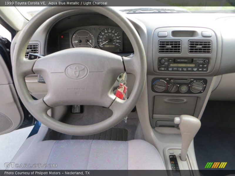 Aqua Blue Metallic / Light Charcoal 1999 Toyota Corolla VE