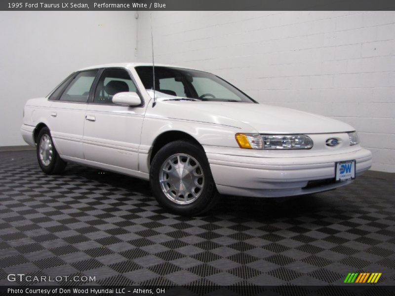 Performance White / Blue 1995 Ford Taurus LX Sedan