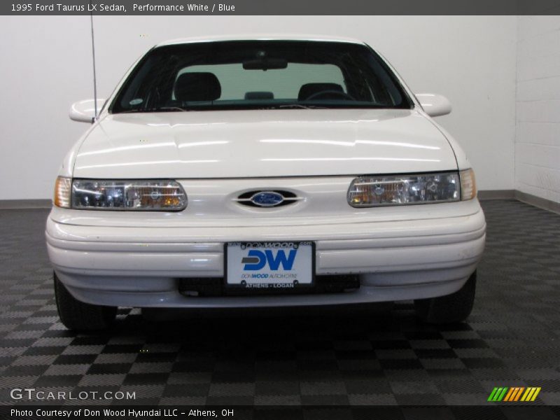 Performance White / Blue 1995 Ford Taurus LX Sedan