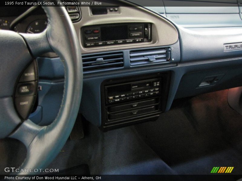 Performance White / Blue 1995 Ford Taurus LX Sedan