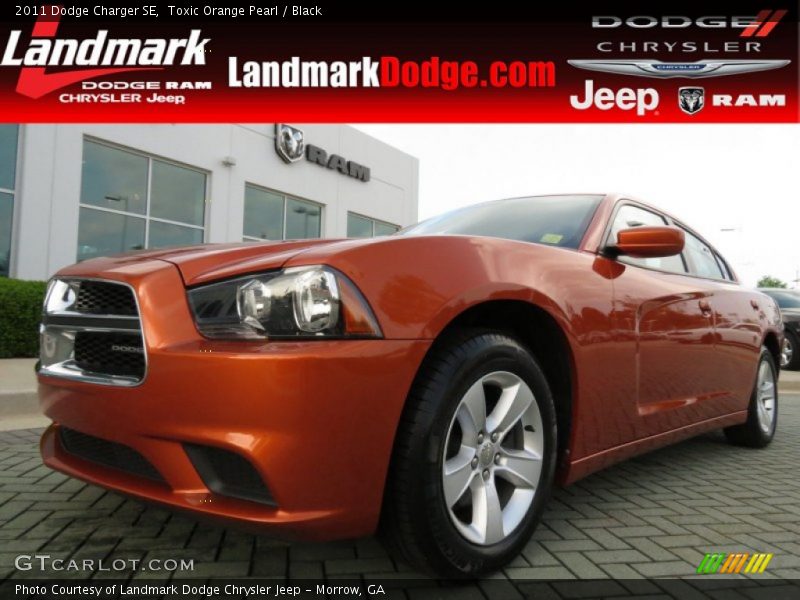 Toxic Orange Pearl / Black 2011 Dodge Charger SE