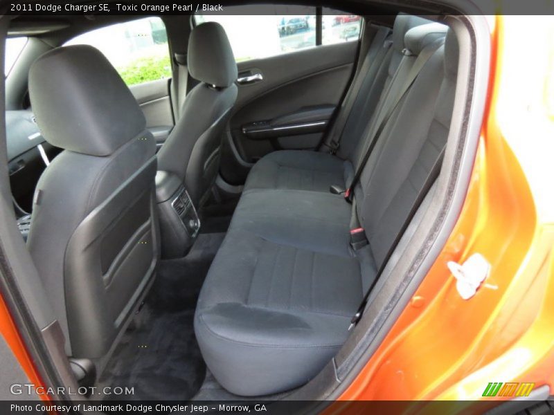 Toxic Orange Pearl / Black 2011 Dodge Charger SE