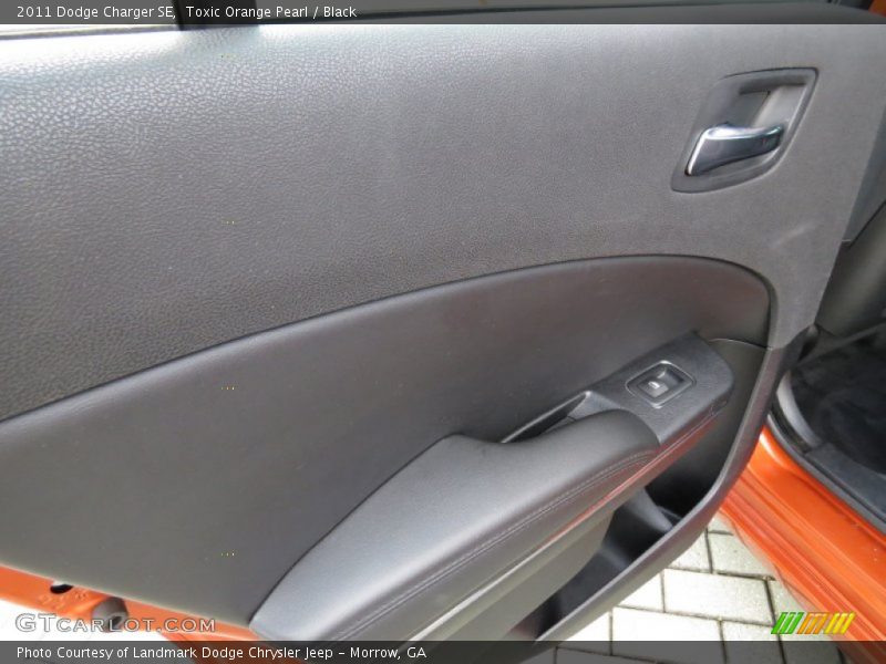 Toxic Orange Pearl / Black 2011 Dodge Charger SE