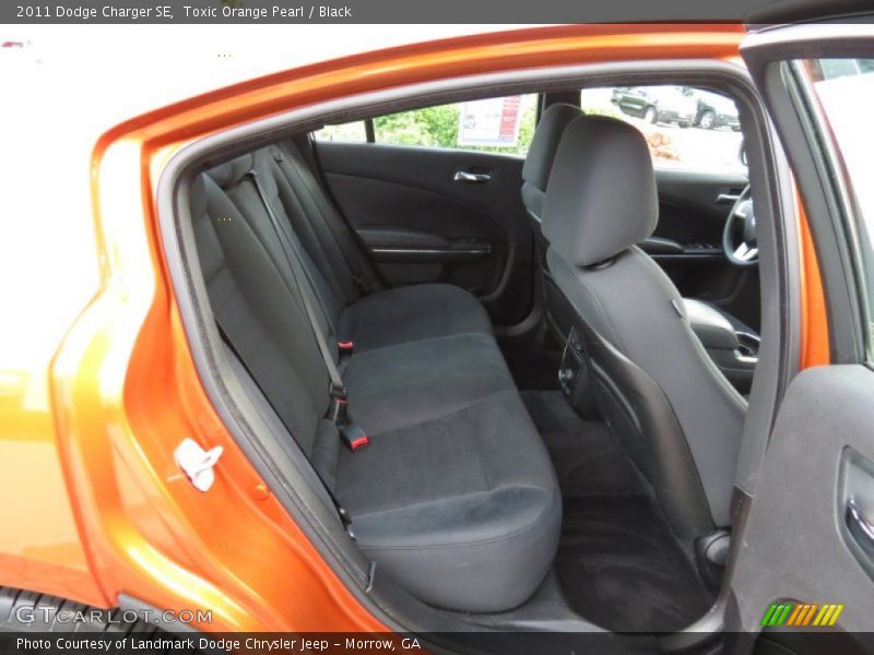 Toxic Orange Pearl / Black 2011 Dodge Charger SE