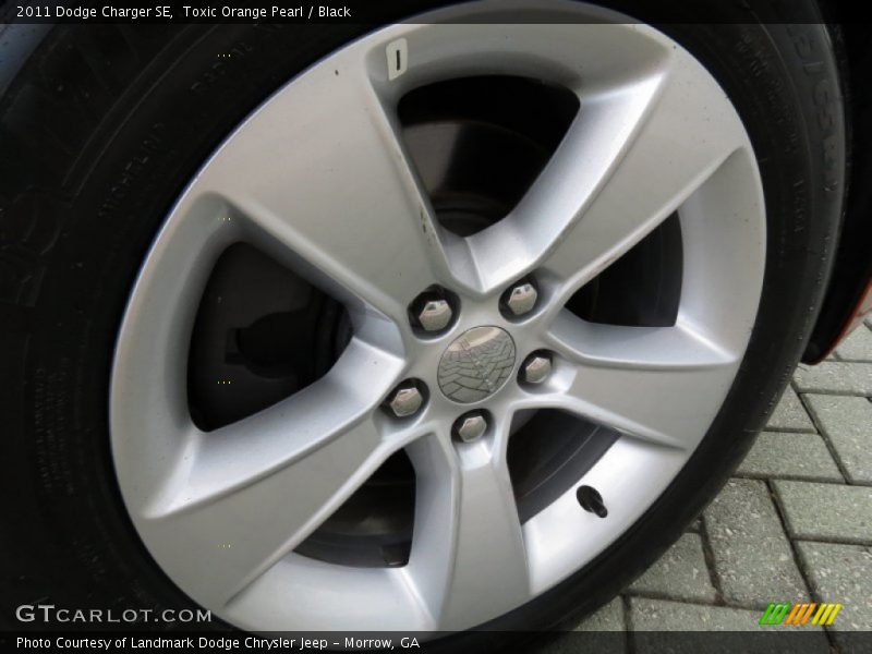 Toxic Orange Pearl / Black 2011 Dodge Charger SE