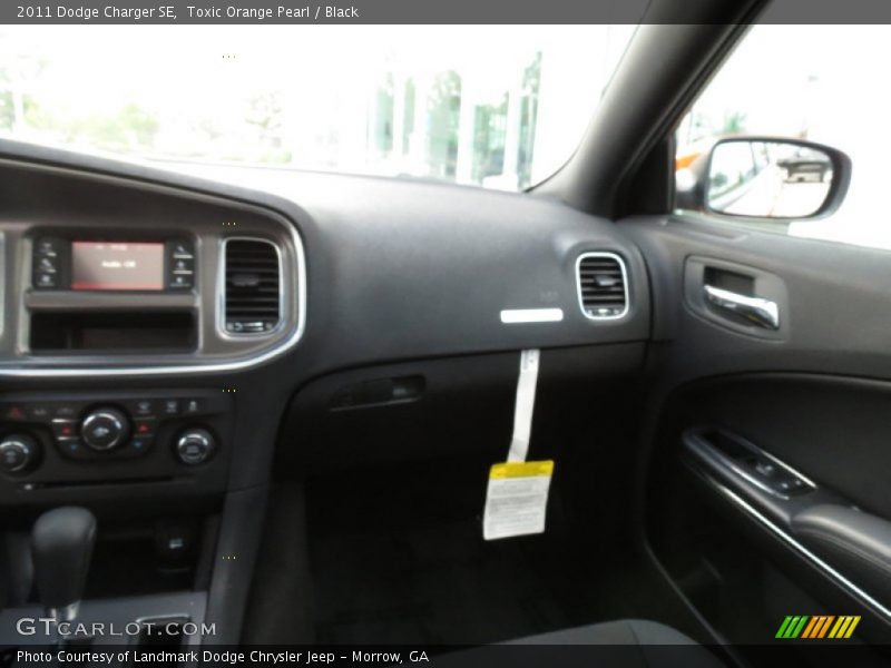 Toxic Orange Pearl / Black 2011 Dodge Charger SE